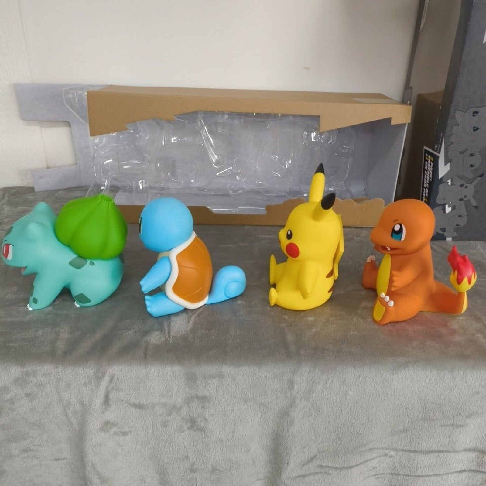 Open Box Pokemon Vinyl 8" Figures 4 Count Bulbasaur Squirtle Pikachu Charmander