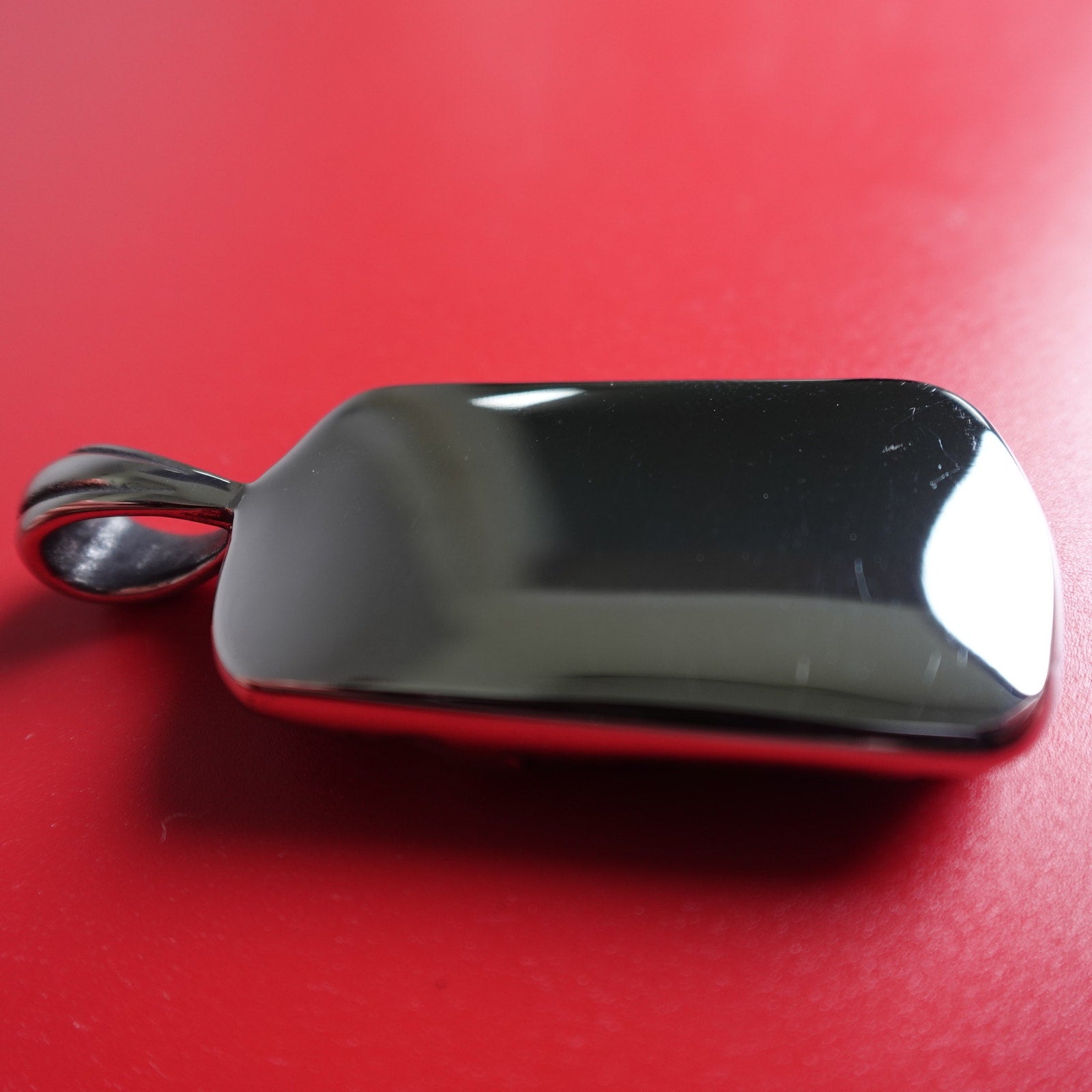 Stainless Steel Red Cubic Zirconia Encrusted Dog Tag with Skulls SP-1810