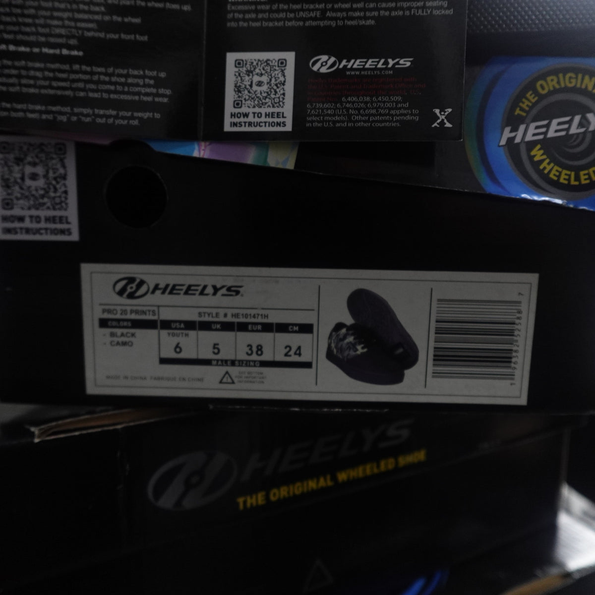 Heely's pro 20's black and camo size 6