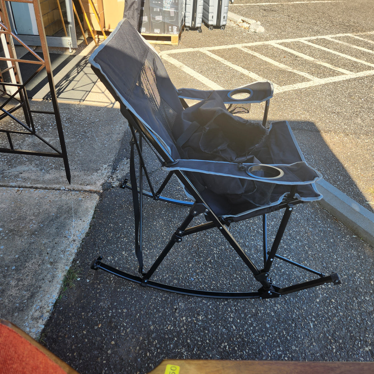 World Famous Sports Quad Folding Rocking Chair